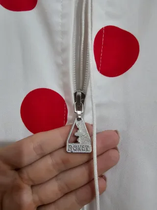 Traje de flamenca blanco con lunares rojos