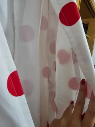Traje de flamenca blanco con lunares rojos