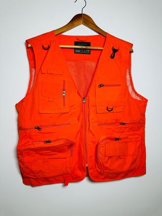Chaleco multibolsillos naranja pesca fotografía