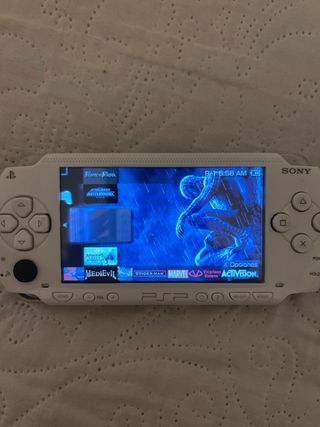 Sony PSP 1004 Bianca con giochi e caricatore