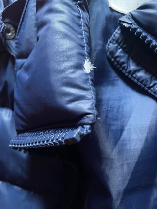 Chamarra azul entallada S , plumas