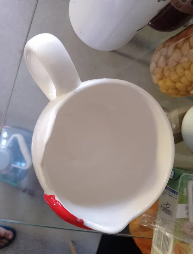 Taza Hello Kitty Blanca con Lazo Rojo