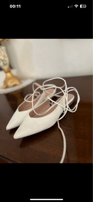 Sandali bianchi eleganti con lacci