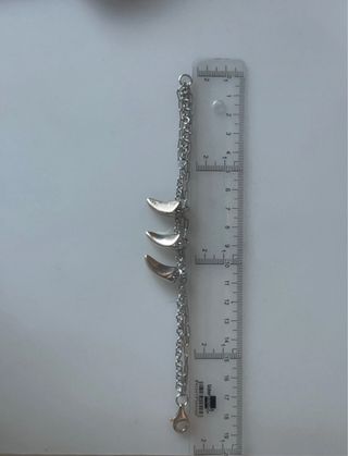 Pulsera plata 3 cadenas con 3 colmillos