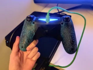 PlayStation 4 Slim + Mando con Palancas (Paddles)