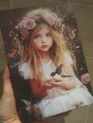 Quadro bambina uccellino20 x30 circa2 cm so.