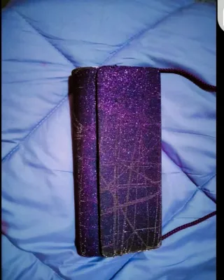 Bolso morado con brillos sin estrenar