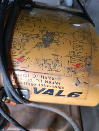 Calentador Gasoil Negro y Amarillo pare arreglar o