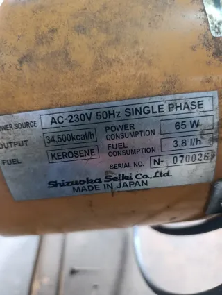 Calentador Gasoil Negro y Amarillo pare arreglar o