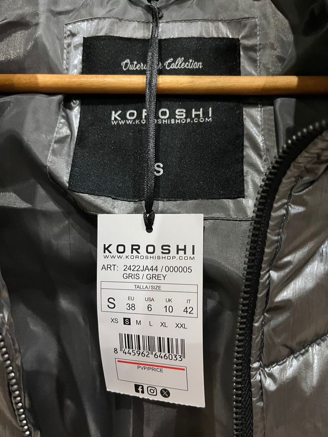 Chaleco acolchado gris metalizado