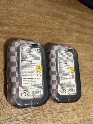 Pack 2 latas Pokémon Fulgor negro/ Llama Blanca