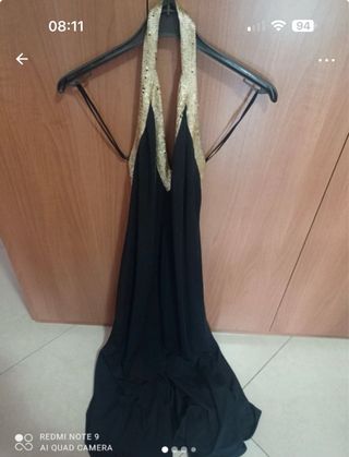 Abito nero e oro con paillettes scollo a V