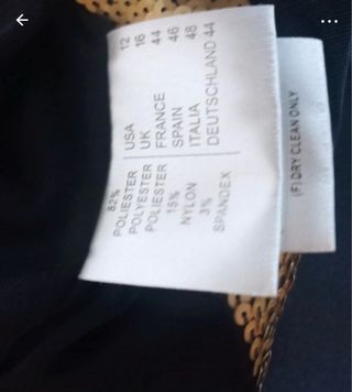 Abito nero e oro con paillettes scollo a V