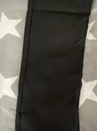 Pantalones negros cuero sintético