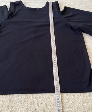 Blusa negra escote V reversible