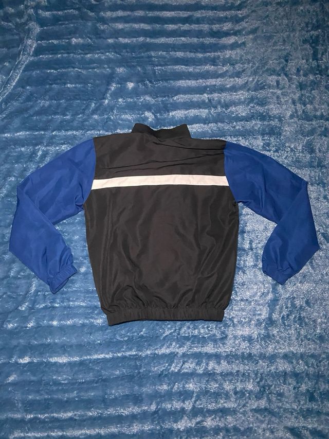 Chaqueta Deportiva Lacoste Negra y Azul