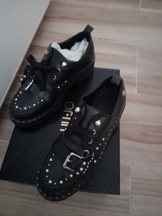 Scarpe Lui Jo con borchie nere