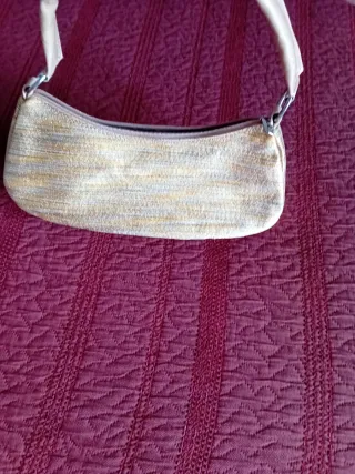 Bolso de fiesta dorado y plateado