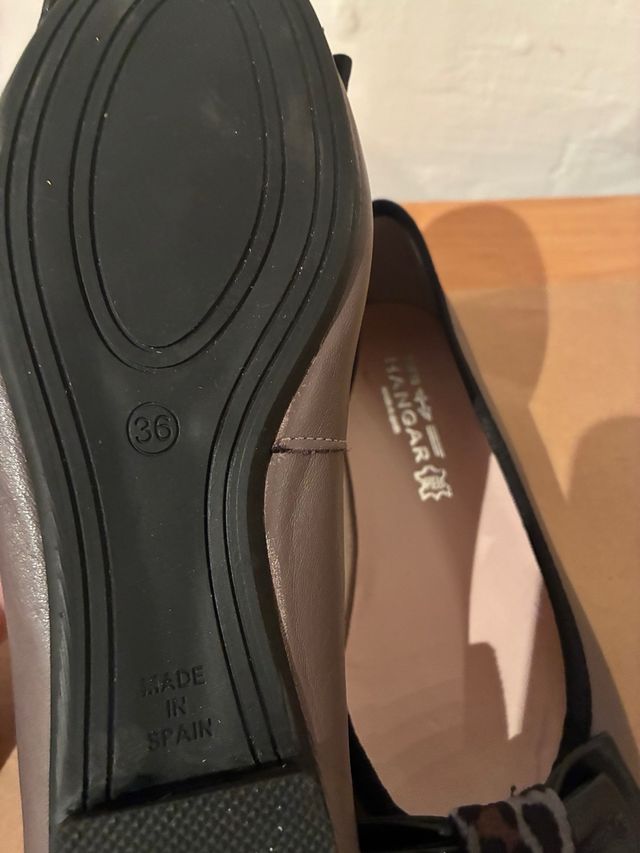 Zapatos planos negros con lazo