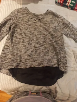 Jersey gris y negro con pedrería