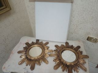 Coppia specchi a forma di sole dorati