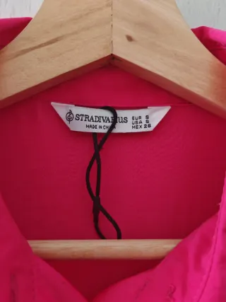 Camisa fucsia elegante talla S. Talla grande