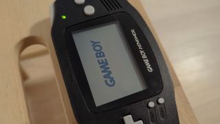 Nintendo Gameboy Advance Nero + Rosso Fuoco