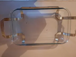 Pirofila in vetro con manici dorati