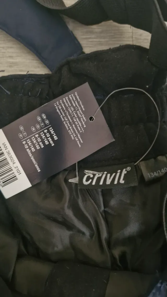 Conjunto pantalón y botas nieve niño