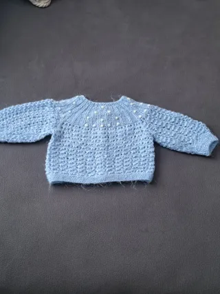 Jersey bebé tejido a mano azul