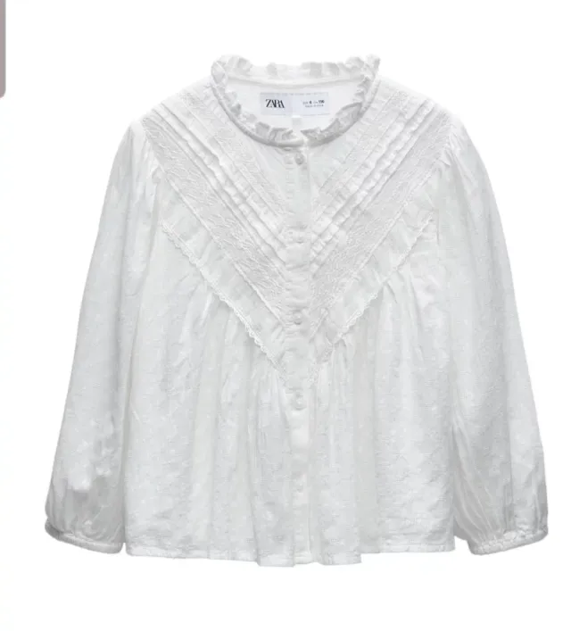 Blusa niña Zara blanca con volantes