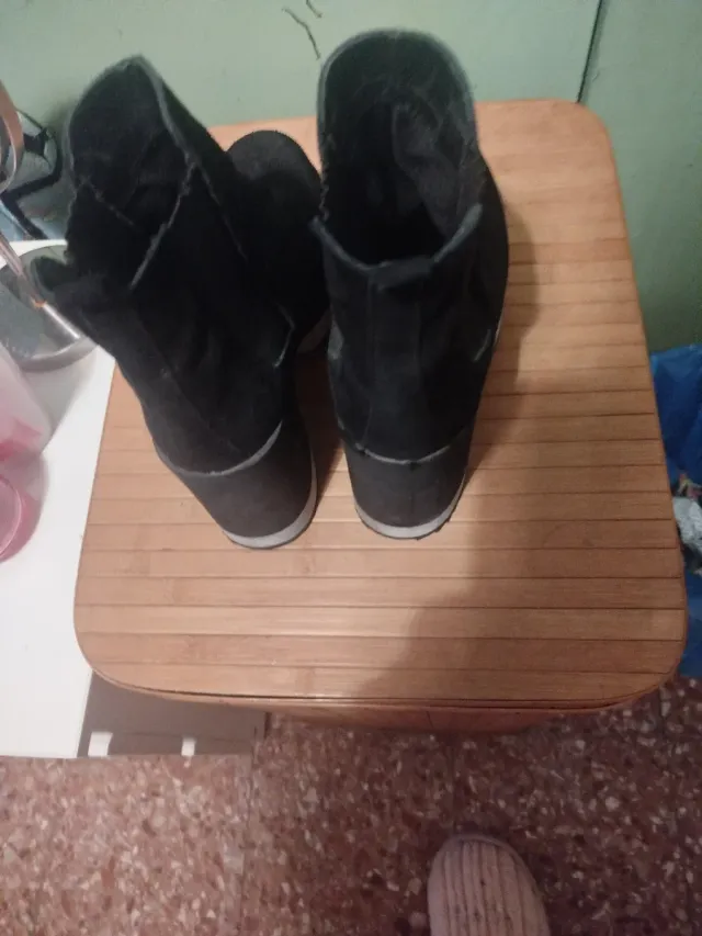 Botas de salto pretas para mulher