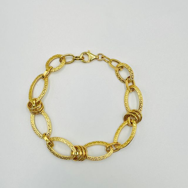 PULSERA DISEÑO ITALIANO GRECA AROS. Hueca. Oro 18k