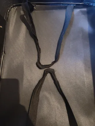 Maleta de viaje negra con ruedas