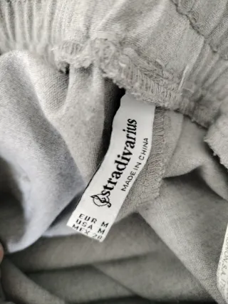 Pantalones de mujer grises Stradivarius y multicol