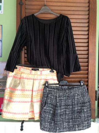 Donna: maglia nera e 2 gonne