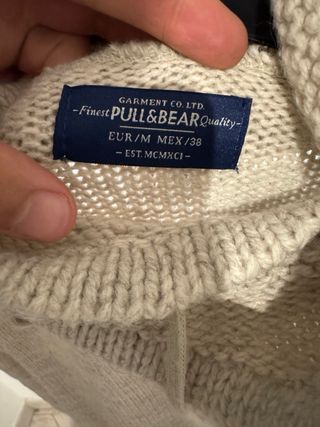 Maglione collo alto beige