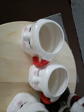 Babbo Natale con 4 tazze