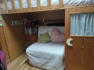 Cama alta con armario