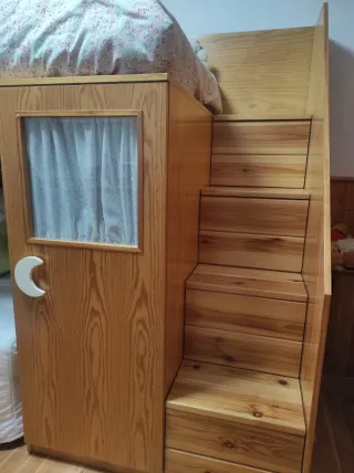 Cama alta con armario