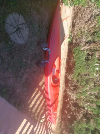 Piragua , kayak de mar rojo