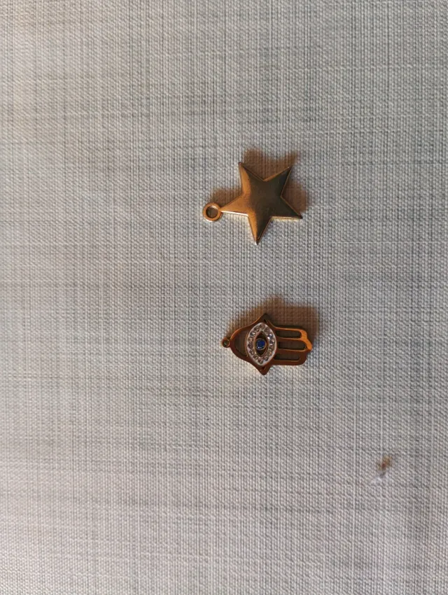 Ciondolo imitazione oro stella e mano