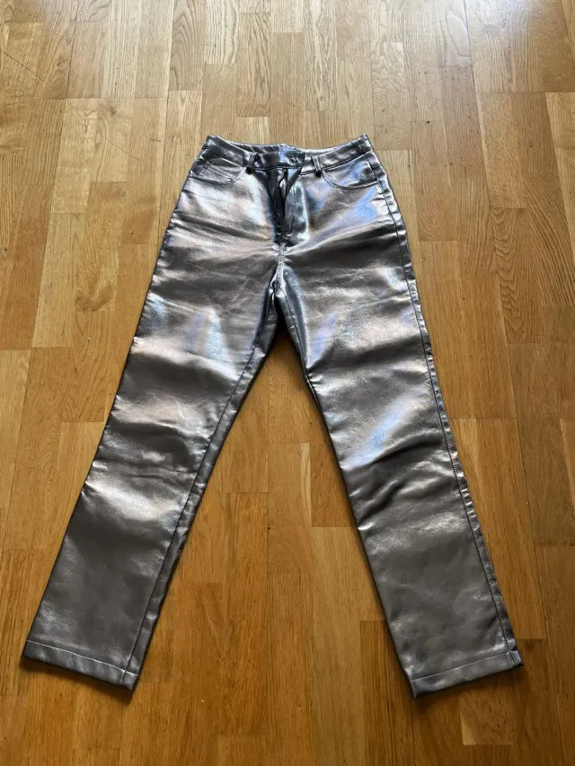 Pantalones dorados niña mango