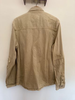 Chaqueta vaquera beige desgastada