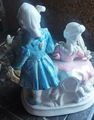 Pareja de porcelana figuras decorativas