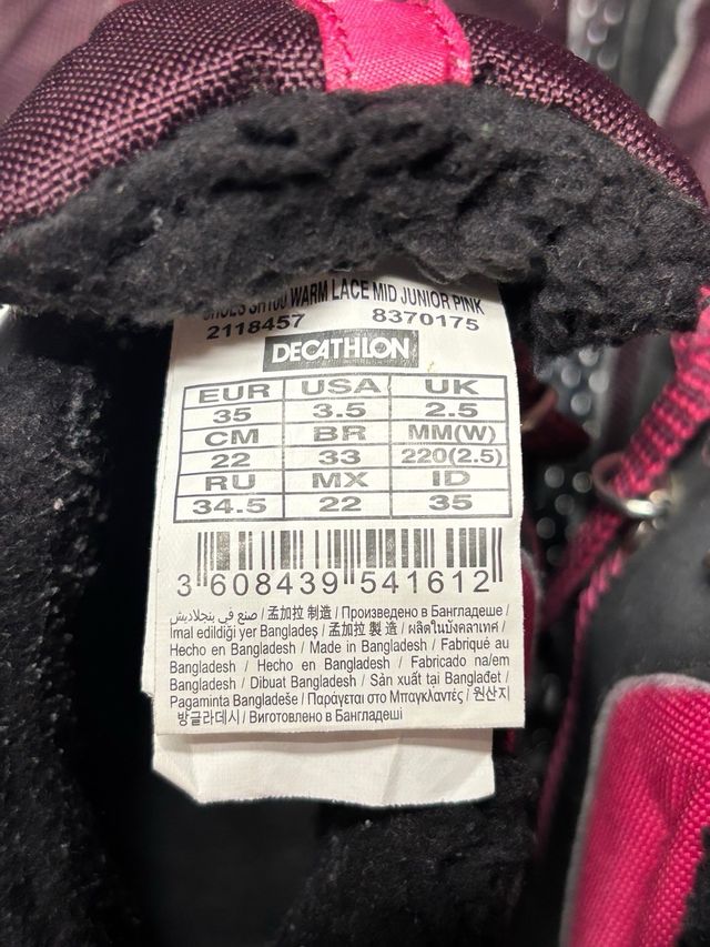 Botas de invierno rosas y moradas