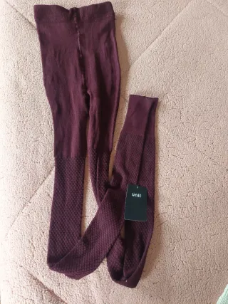 Leotardos unit talla L de color granate. Tobillero