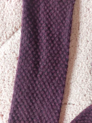 Leotardos unit talla L de color granate. Tobillero