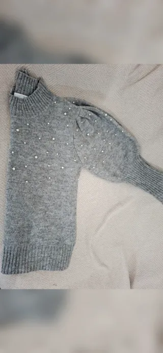 Jersey gris perlas cuello alto mujer