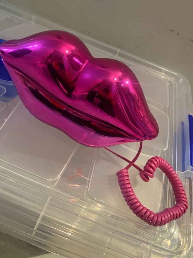 Teléfono labios rosa